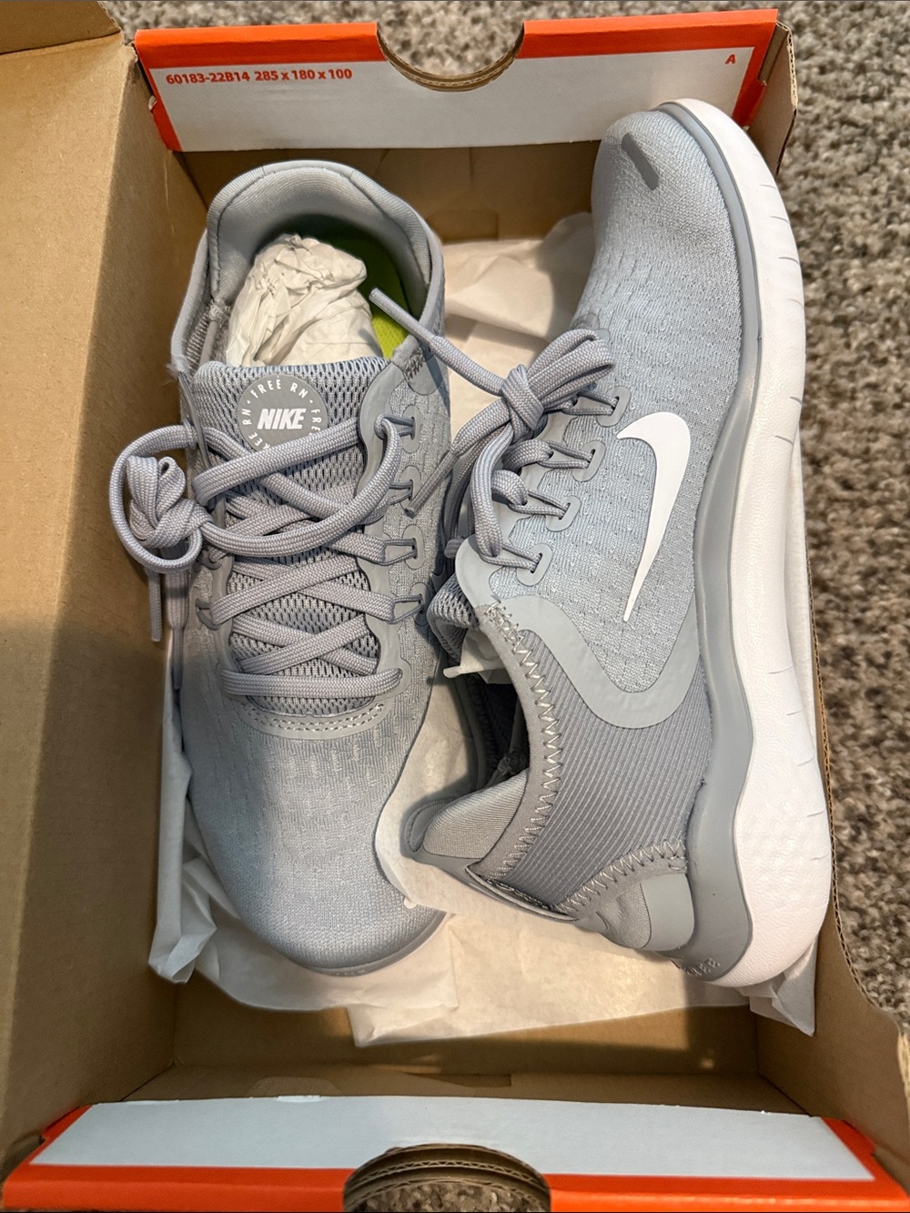Nike Women’s Light Gray Lace-Up Sneakers